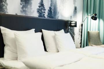 Фото номера Стандартный двухместный номер с 2 отдельными кроватями Отель Hotel Sveitsi г. Хювинкяя 7