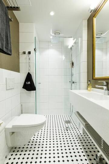 Фото номера Стандартный двухместный номер с 2 отдельными кроватями Отель Hotel Sveitsi г. Хювинкяя 8
