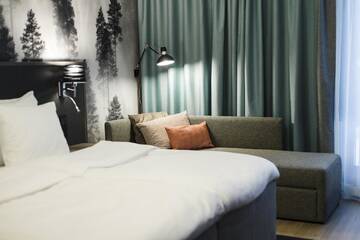 Фото номера Стандартный семейный номер Отель Hotel Sveitsi г. Хювинкяя 3